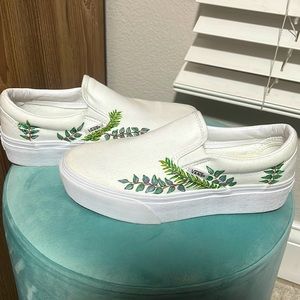 White customed vans Size:6.5 in women and 5.0 in men.